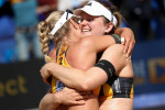 03 July 2019, Hamburg: Beach Volleyball, World Championship, at Rothenbaum Stadium: Round of 32, Women. Borger/Sude (Germany) - Behrens/Tillmann (Germany). Karla Borger and Julia Sude (r) are happy about their victory on the Center Court. Photo: Christian