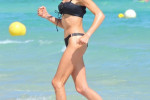 *EXCLUSIVE* Cathy Hummels (wife of German footballer Mat Hummels) sports a black bikini while on the beach in Palma de Mallorca