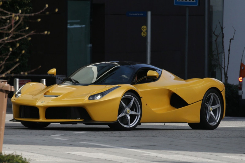 Milan AC soccer player Zlatan Ibrahimovic drives his limited production hybrid sport car Ferrari