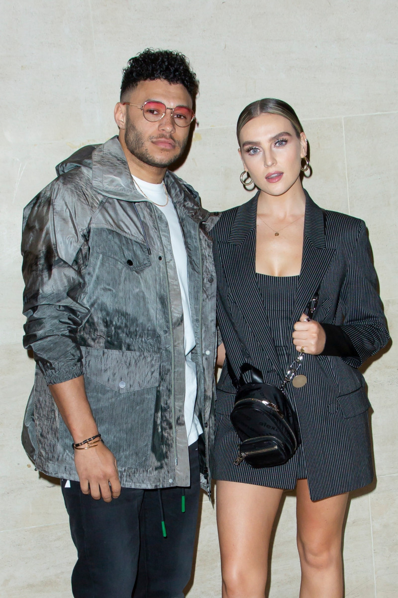Perrie Edwards looks giddy as she cosies up to boyfriend Alex Oxlade-Chamberlain