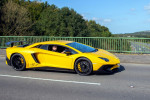 2016 yellow Lamborghini Aventador LP 750-4 SV S-A Vehicular traffic moving vehicles, cars driving vehicle on UK roads, motors, motoring on the M6 motorway highway network.