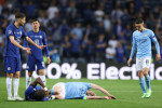 PORTO, PORTUGAL - MAY 29: Antonio Rudiger of Chelsea and Kevin De Bruyne of Manchester City are on the floor after colliding into each other during the UEFA Champions League Final between Manchester City and Chelsea FC at Estadio do Dragao on May 29, 2021