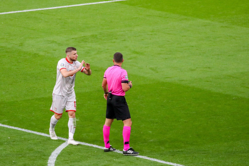 AMSTERDAM, NETHERLANDS - JUNE 21: Stefan Ristovski of North Macedonia, Referee Istvan Kovacs during the UEFA Euro 2020 Championship Group C match between North Macedonia National Team and Netherlands National Team at the Johan Cruijff ArenA on June 21, 20