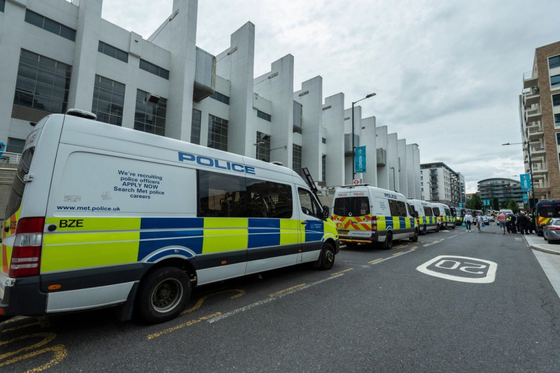 London, UK. 11 July 2021. Police monitor England fans outside Wembley Stadium ahead of the final of Euro 2020 between Italy and England. It is the first major final that England will have played in since winning the World Cup in 1966 and Italy remain u