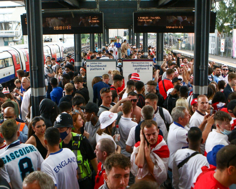 Wembley, London, UK. 12th July, 2021. The Wembley Park station is packed with people as they wait for the train to travel towards central London. 11/07/2021, Marcin Riehs/Pathos Credit: One Up Top Editorial Images/Alamy Live News
