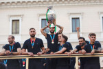 ROME, ITALY - JULY 12, 2021. Lorenzo Insigne (center) and the others footballers of the Italian national team celebrate the victory at Euro 2020 by exhibiting the European Cup from an open bus with a tour in the center of Rome. Credit: Andrea Petinari/Med