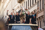 ROME, ITALY - JULY 12, 2021. Federico Bernardeschi, Alessandro Florenzi, Ciro Immobile and Leonardo Bonucci of the Italian national team celebrate the victory at Euro 2020 by exhibiting the European Cup from an open bus with a tour in the center of Rome.