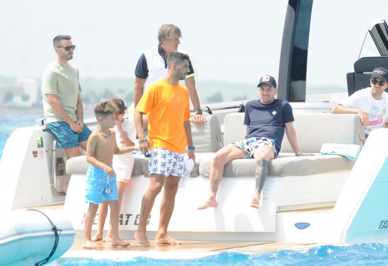 Soccer player Lionel Messi and Luis Suarez enjoy a boat day with their family