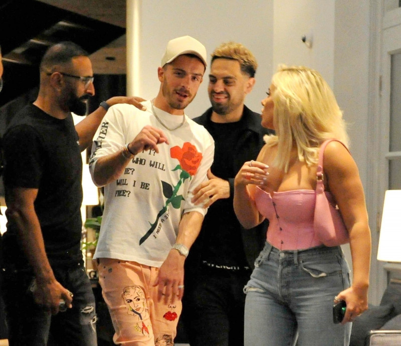 *PREMIUM-EXCLUSIVE* *MUST CALL FOR PRICING BEFORE USAGE* **STRICTLY NOT AVAILABLE FOR THE SUN** Manchester City's 100 million man Jack Grealish parties the night away with Love Island's Ellie Brown out in Manchester.