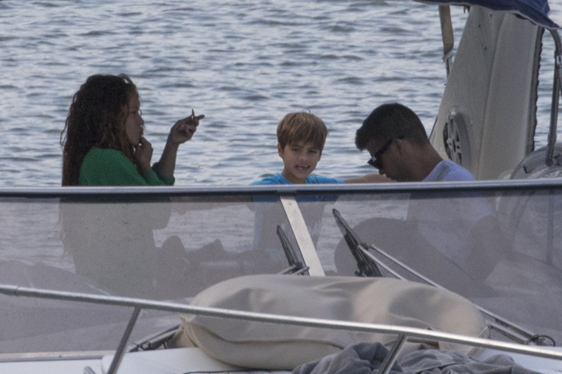 EXCLUSIVE: Shakira and her soccer star husband Gerard Pique are pictured on a yacht during their family vacation