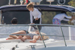 EXCLUSIVE: Shakira and her soccer star husband Gerard Pique are pictured on a yacht during their family vacation