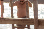EXCLUSIVE: Shirtless Ronaldo Nazario enjoys a swim in the waters of Ibiza