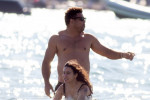 EXCLUSIVE: Shirtless Ronaldo Nazario enjoys a swim in the waters of Ibiza