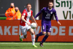 Emmen, Netherlands. 25th Apr, 2021. EMMEN, NETHERLANDS - APRIL 25: Paul Gladon of FC Emmen battles for posession with Marco Rente of Heracles during the Dutch Eredivisie match between FC Emmen and Heracles Almelo at De Oude Meerdijk on April 25, 2021 in E