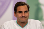 Roger Federer attends a press conference in the Main Interview Room after losing against Hubert Hurkacz in the quarter-final of the Gentlemen's Singles on Centre Court on day nine of Wimbledon at The All England Lawn Tennis and Croquet Club, Wimbledon. Pi