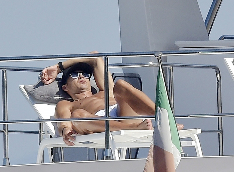 *EXCLUSIVE* Juventus FC footballer Cristiano Ronaldo and his partner Georgina Rodriguez pictured relaxing with friends on a yacht in Portofino.