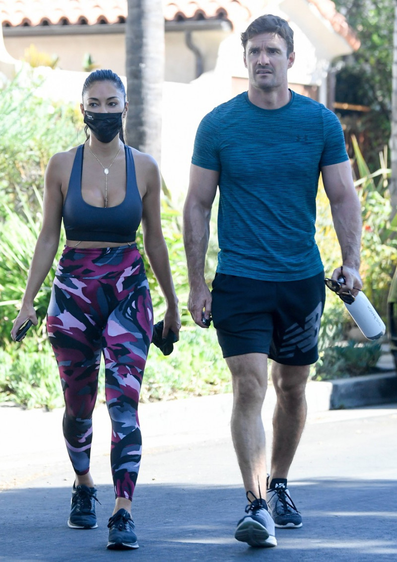 EXCLUSIVE: Nicole Scherzinger and Thom Evans leave a home gym