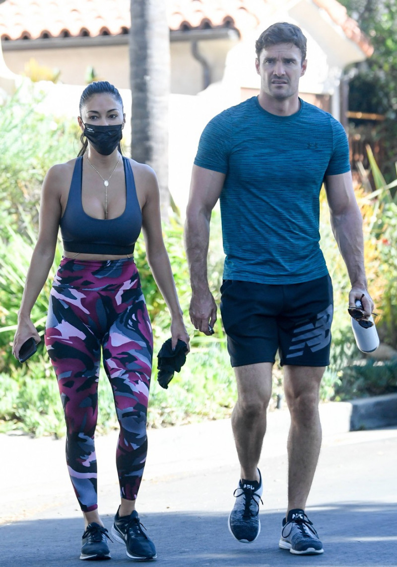 EXCLUSIVE: Nicole Scherzinger and Thom Evans leave a home gym
