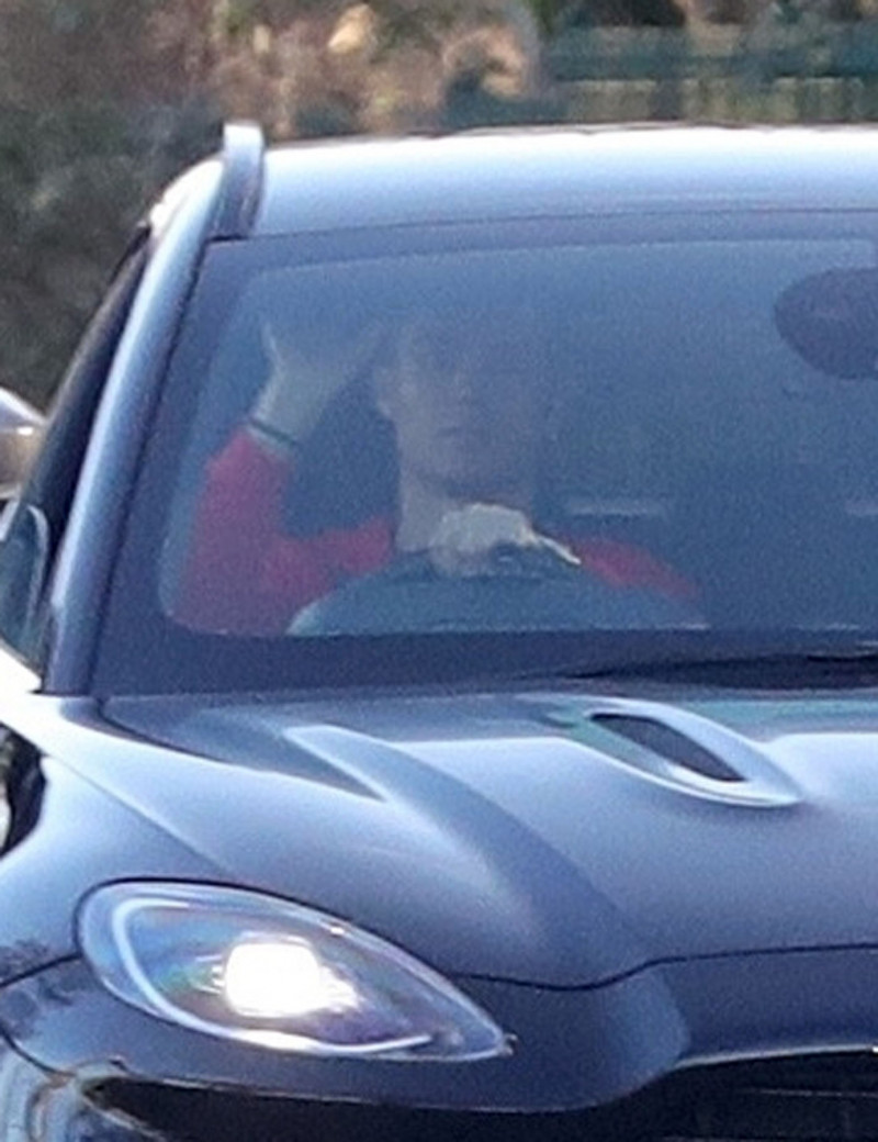 Footballer Cristiano Ronaldo is seen leaving Manchester United training in an Aston Martin.