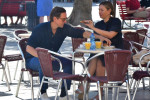 *EXCLUSIVE* Russian tennis player Maria Sharapova and her boyfriend Alexander Gilkes share a crossiant before enjoying some sightseeing in Venice