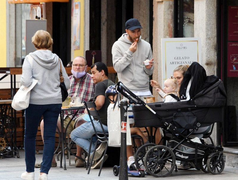 *EXCLUSIVE* Danish footballer Christian Eriksen is seen with his wife Sabrina Kvist Jensen and their children while out enjoying a walk together before going to grab some ice cream as they are seen out in Milan.