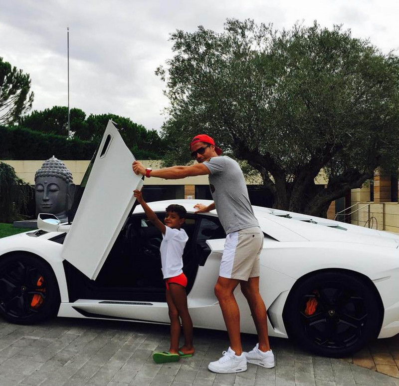 Cristiano Ronaldo with son getting into his car