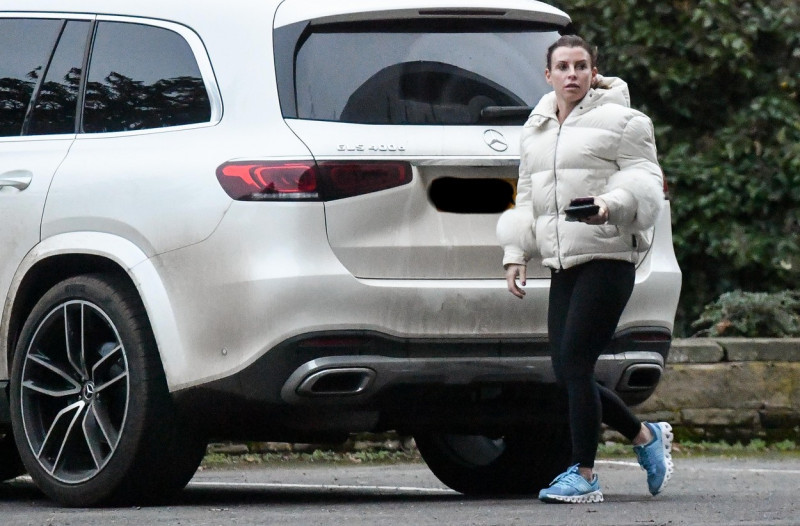 EXCLUSIVE: Coleen Rooney Is Seen In For The First Time In 2022 As She Stops For A Coffee In Cheshire With Son Cass.