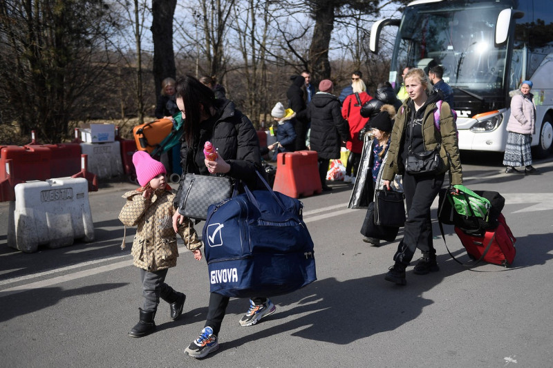 Ukrainians Flee Across Border to Romania