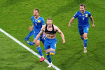 Ukraine's Artem Dovbyk celebrates scoring their side's second goal of the game with team-mates during the UEFA Euro 2020 round of 16 match at Hampden Park, Glasgow. Picture date: Tuesday June 29, 2021.