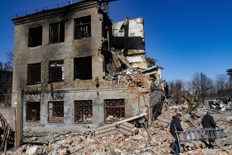 Aftermath of rocket fire continues to be eliminated in Dnipro, Ukraine - 21 Mar 2022