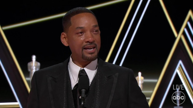 Will Smith turns on the tears as he uses Best Actor Oscar win speech to defend shocking on-air assault on Chris Rock for joke about wife Jada Pinkett Smith's 'GI Jane' haircut.
