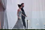 David Beckham and his wife Victoria Beckham enter the dinner tent after their son Brooklyn married Nicola Peltz in Palm Beach