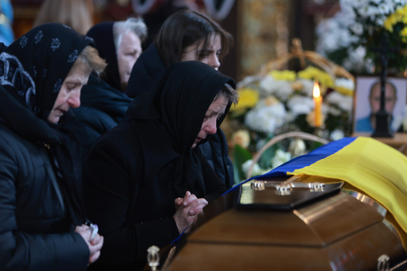 Funeral Held For Ukrainian Serviceman As Losses Mount In Monthlong War