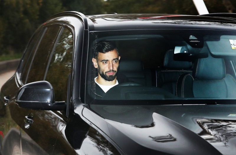 Manchester United players arrive for a training session - AON Carrington Training Complex