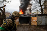 Fire at a garage following a Russian artillery strike in Kharkiv, Ukraine - 18 Apr 2022