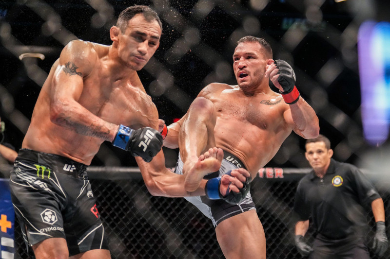 Phoenix, Arizona, United States. 07th May, 2022. PHOENIX, AZ - MAY 7: (R-L) Michael Chandler knocks out Tony Ferguson with a front kick in their Lightweight bout during the UFC 274 event at Footprint Center on May 7, 2022 in Phoenix, Arizona, United State