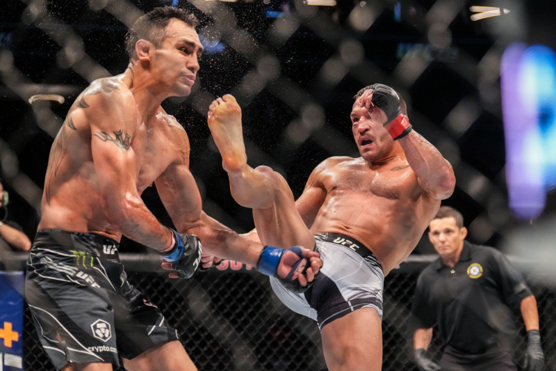 Phoenix, Arizona, United States. 07th May, 2022. PHOENIX, AZ - MAY 7: (R-L) Michael Chandler knocks out Tony Ferguson with a front kick in their Lightweight bout during the UFC 274 event at Footprint Center on May 7, 2022 in Phoenix, Arizona, United State