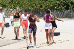 Savannah Chrisley and trainer Jennifer Nicole Smith join other 'Chrisley Knows Best' cast members for a beach work out in Miami
