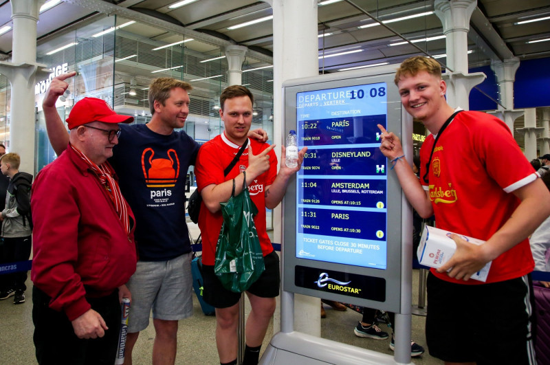 Liverpool supporters travelling to Paris for the UEFA Champions League final, London, UK - 28 May 2022