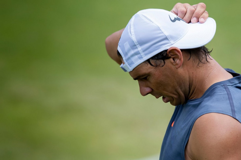 London, UK. 30th June, 2019. The All England Lawn Tennis and Croquet Club, London, England; Wimbledon tennis tournament preview day; Rafael Nadal (ESP) adjusts his hat during practice on Sunday Credit: Action Plus Sports Images/Alamy Live News Credit: Act