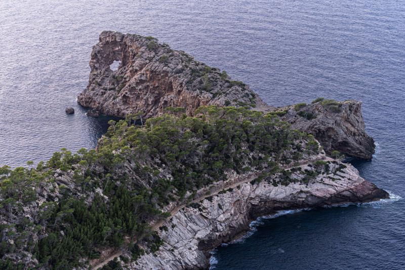 Beautiful image of "La foradada", a very famous natural hole in the rock on the island of Mallorca.