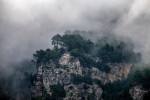 Clouds and misty rain over a cliff in Dei, Mallorca, Spain