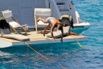 *PREMIUM-EXCLUSIVE* MUST CALL FOR PRICING BEFORE USAGE - STRICTLY NOT AVAILABLE FOR ONLINE USAGE UNTIL 15:50 PM UK TIME ON 02/07/2022 - Manchester United superstar footballer Cristiano Ronaldo flexes his toned muscular body while relaxing on his yacht