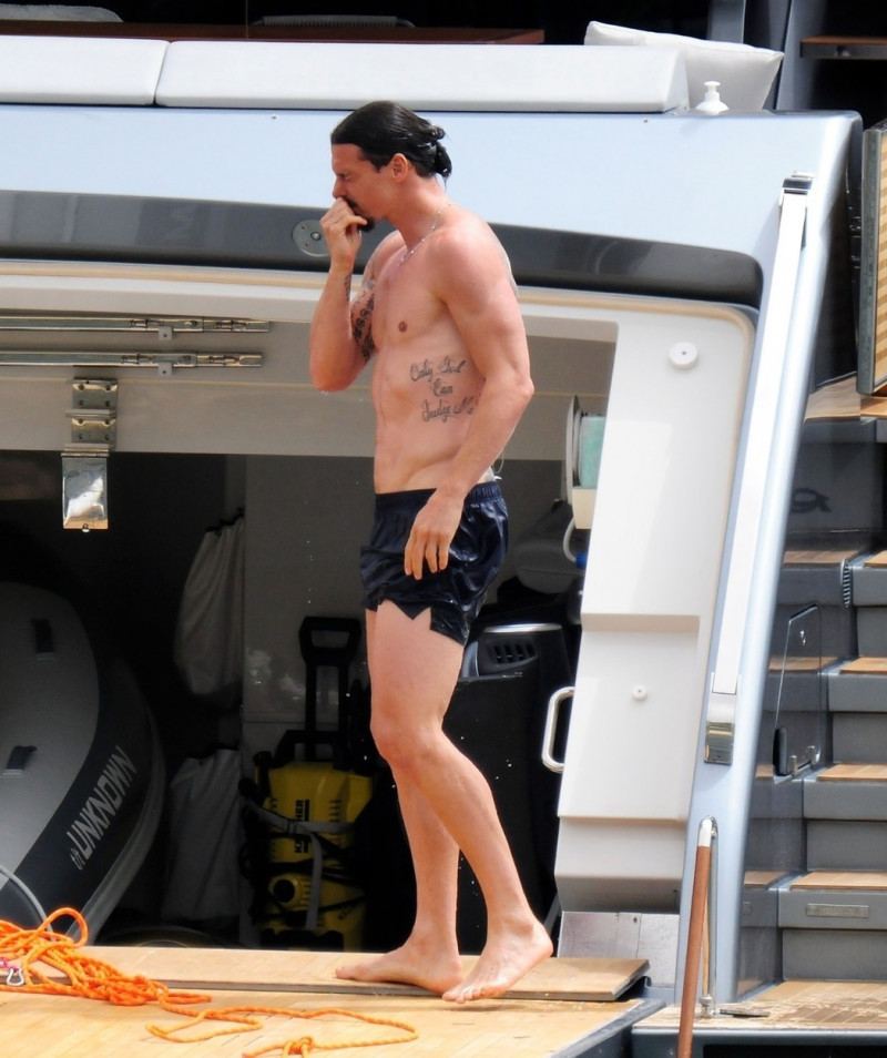 *EXCLUSIVE* 39-year-old Swedish footballer Zlatan Ibrahimovic shows off his super-toned muscly physique while enjoying his holiday with his Family onboard a luxury yacht in Majorca.