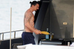 *EXCLUSIVE* 39-year-old Swedish footballer Zlatan Ibrahimovic shows off his super-toned muscly physique while enjoying his holiday with his Family onboard a luxury yacht in Majorca.