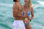 New couple alert! Jack Brinkley-Cook is seen having a beach date with Genie Bouchard