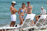 Christie Brinkley's beefcake son Jack Brinkley-Cook and bikini-clad tennis star Genie Bouchard set pulses racing as they frolic on beach in Miami
