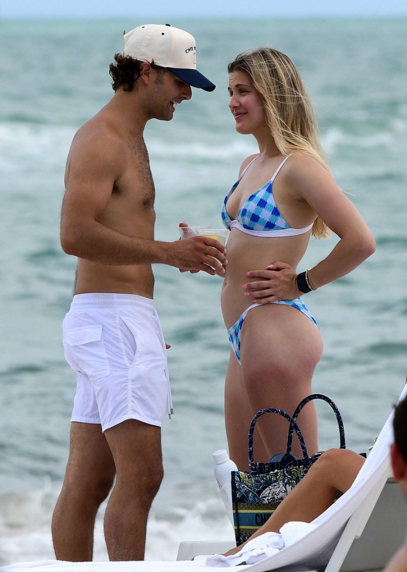 Christie Brinkley's beefcake son Jack Brinkley-Cook and bikini-clad tennis star Genie Bouchard set pulses racing as they frolic on beach in Miami