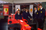 Michael Schumacher of Germany tries out the Lego Ferrari