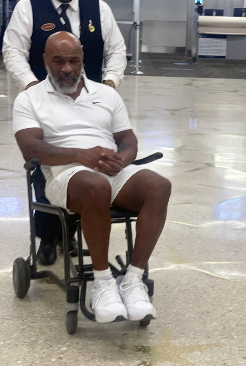 EXCLUSIVE: Mike Tyson is Pictured in a Wheelchair at Miami Airport